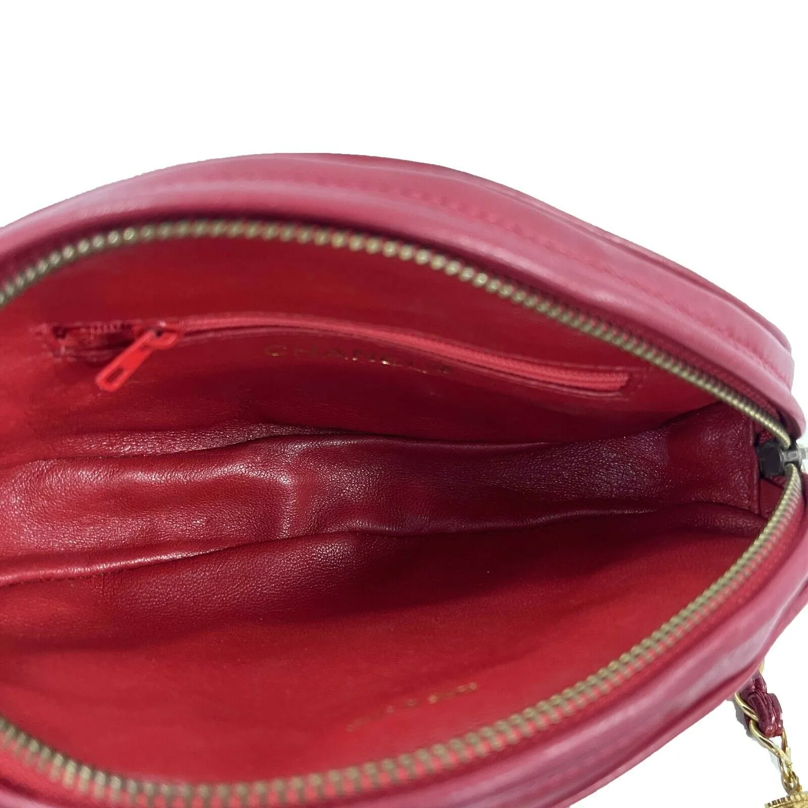 CHANEL - Vintage Quilted Leather CC Oval Red / Gold Tassel Clutch