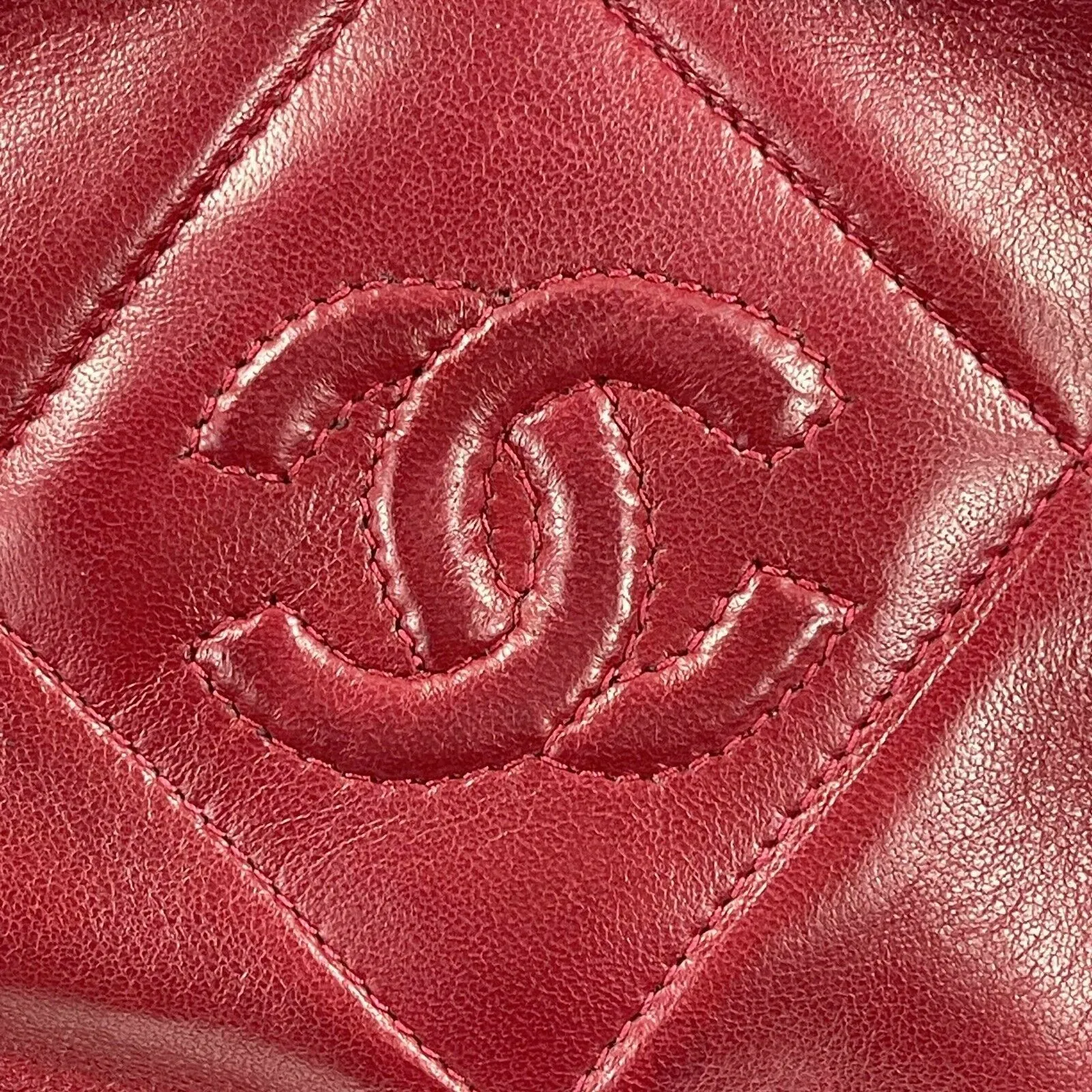 CHANEL - Vintage Quilted Leather CC Oval Red / Gold Tassel Clutch