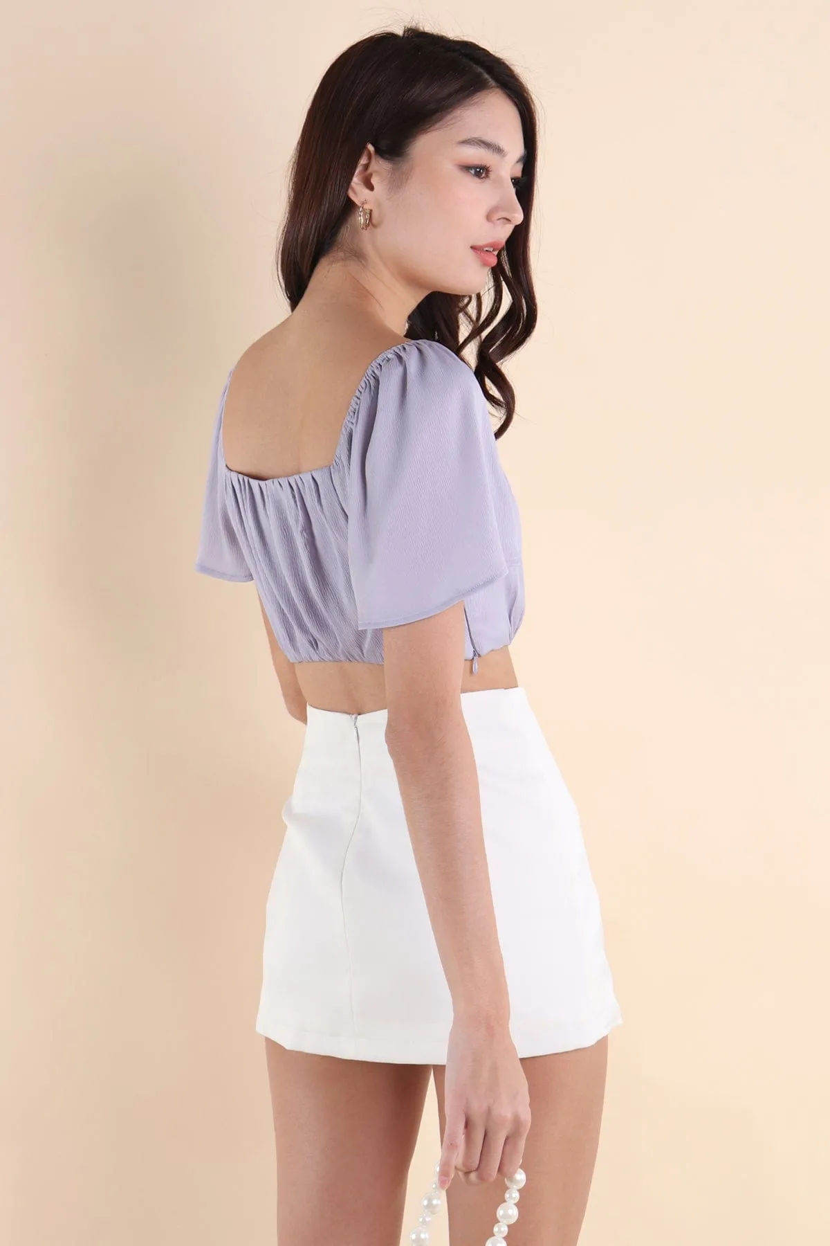 LUMIERE RUCHED TOP IN PERIWINKLE